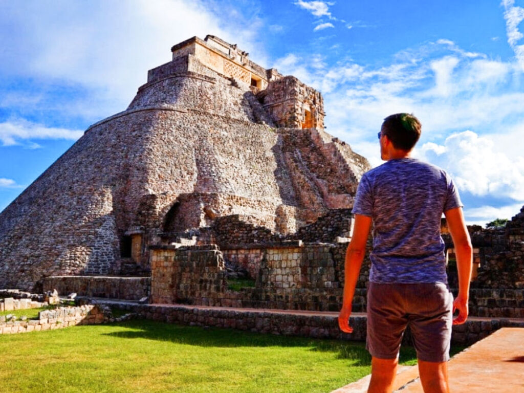 Nate Hake admiring the Mayan ruins on a sunny day in Mexico